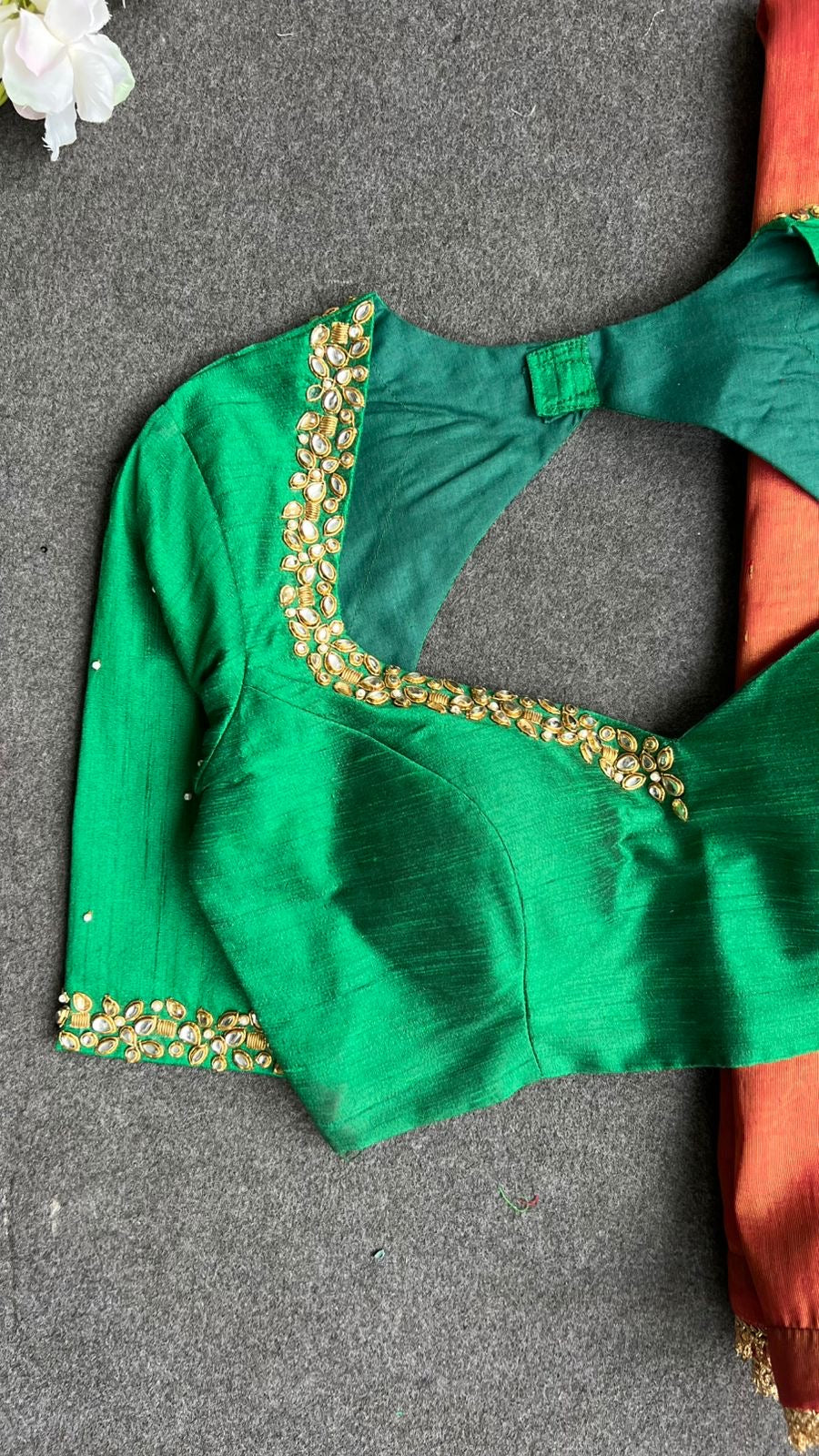 Red tissue saree with green hand work blouse