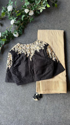Golden cream tissue saree with black hand work blouse