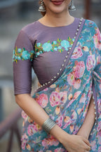 Blue floral georgette saree with grey embroidery blouse