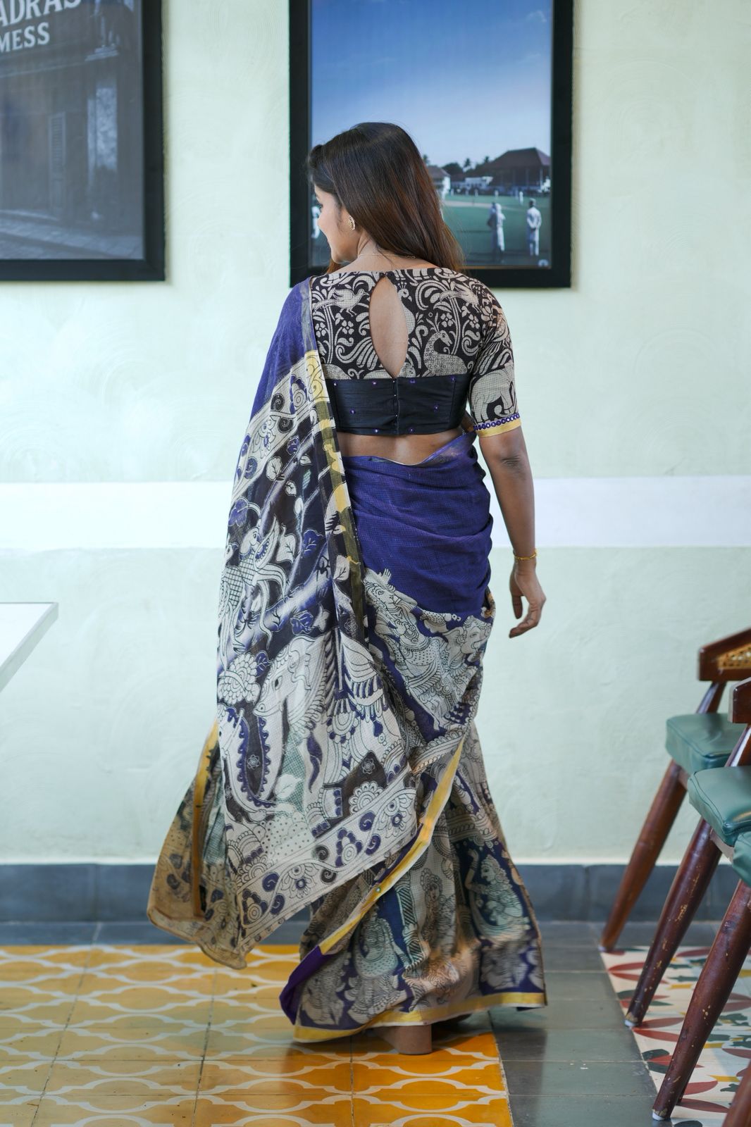 Purple kota saree with kalamkari work blouse
