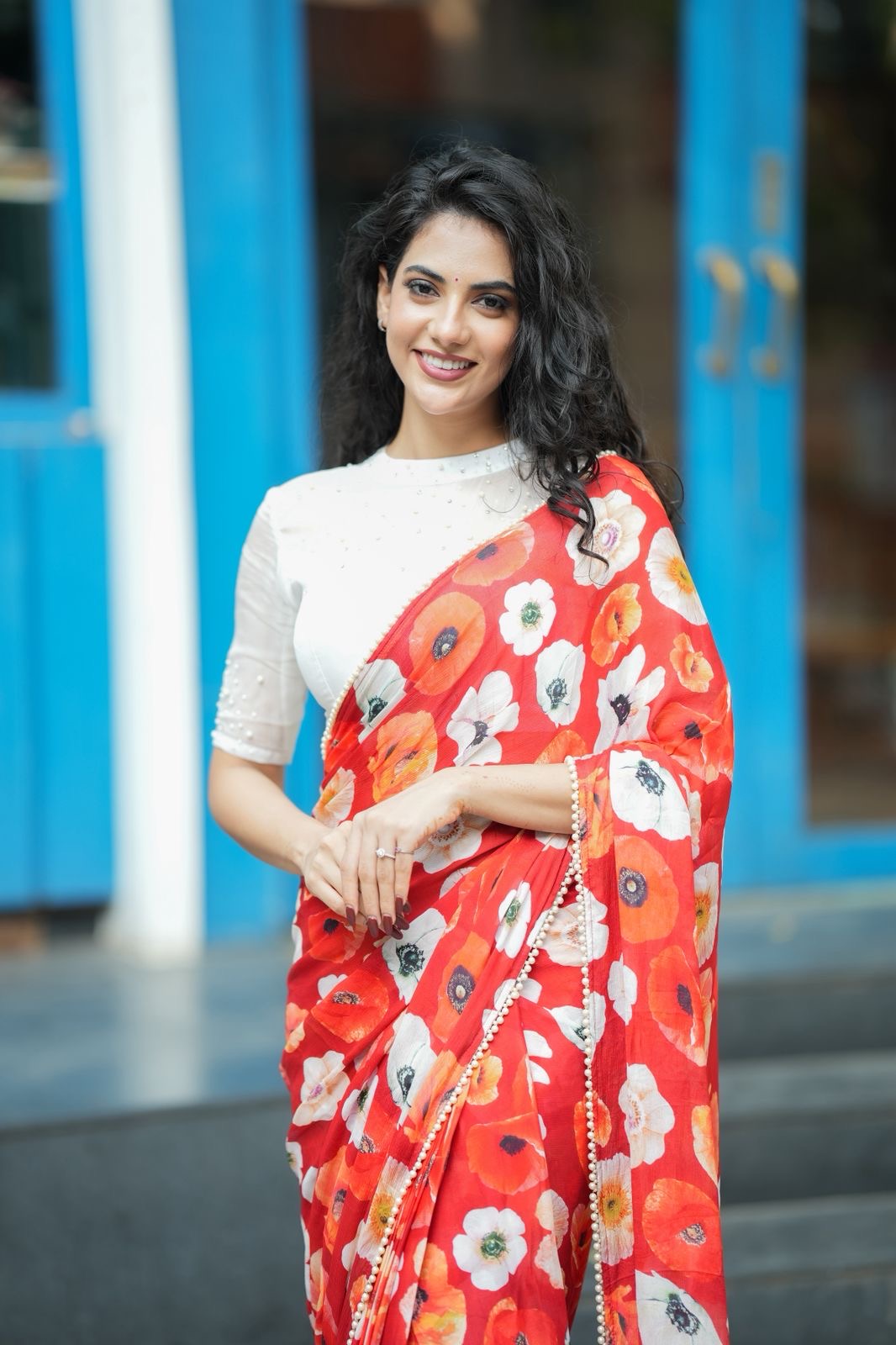 Orange red chinnon silk saree with white organza blouse
