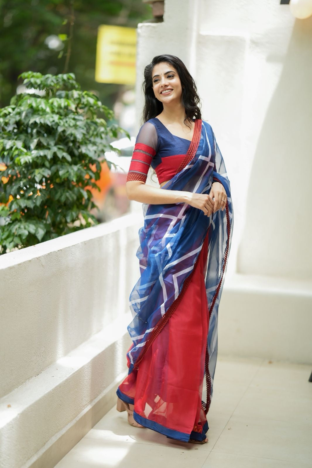 Blue maroon organza saree with patterned blouse