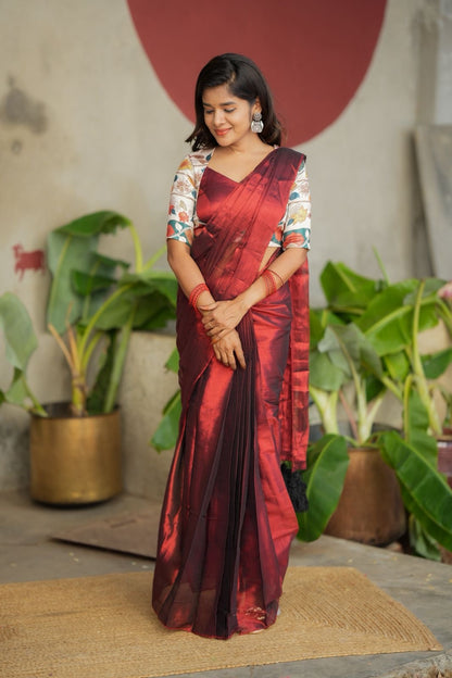 Wine soft tissue saree with floral blouse