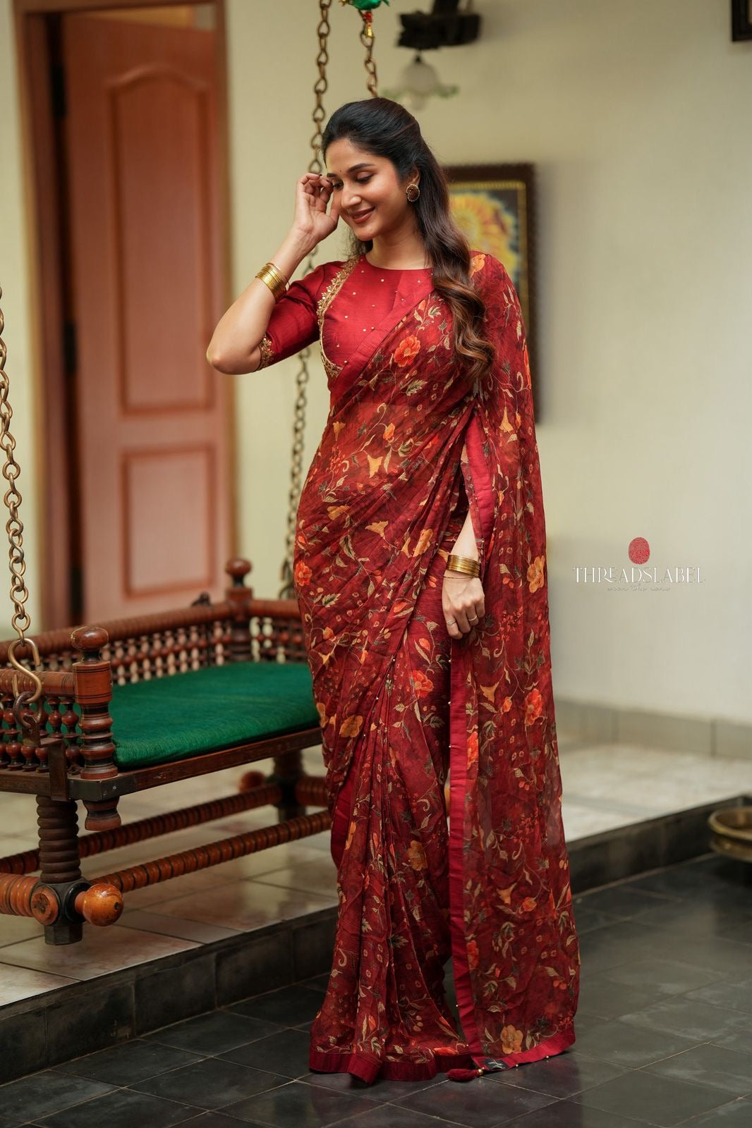 Maroon chiffon floral saree with hand work blouse