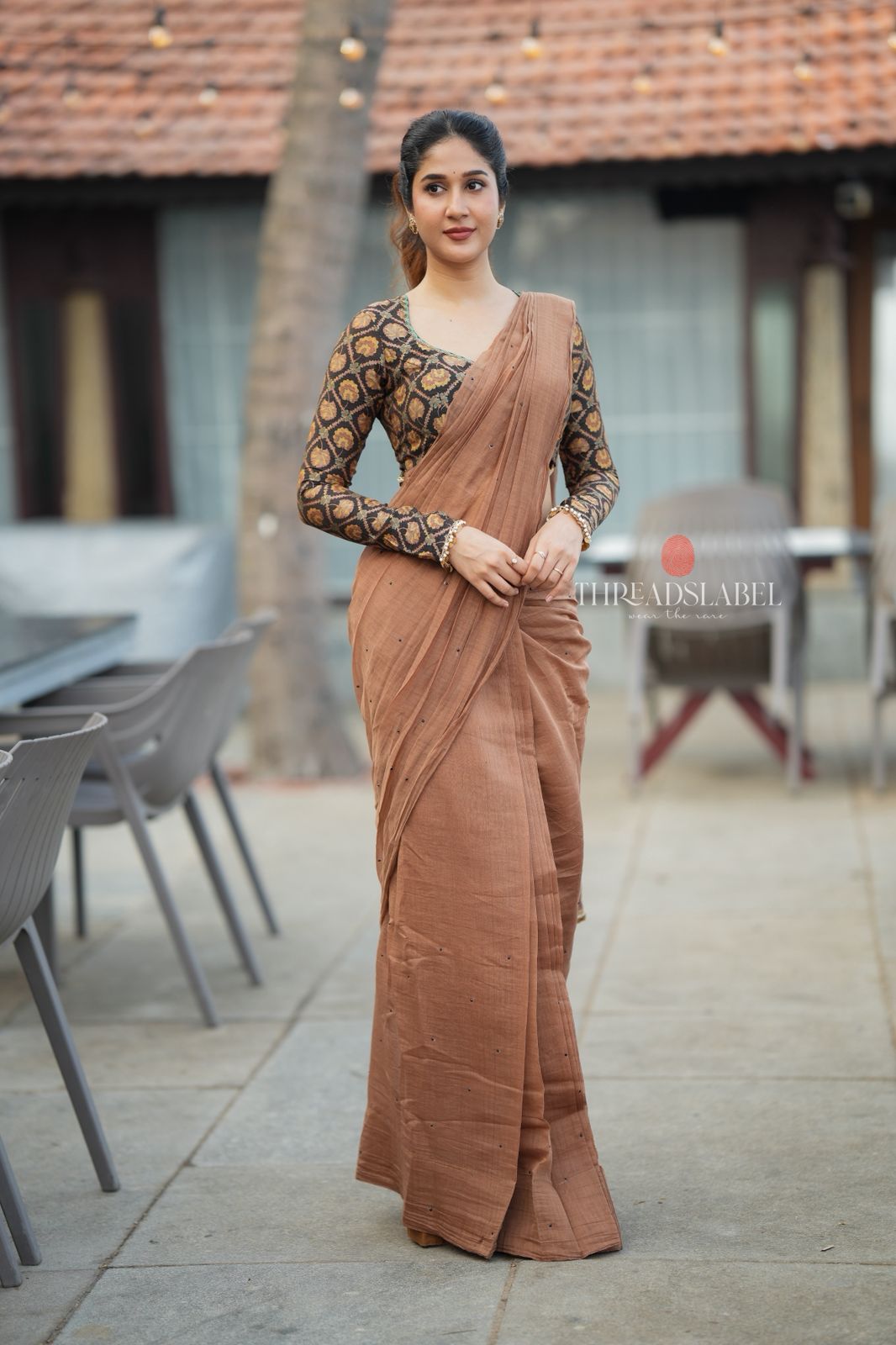 Brown malai chanderi saree with Ajrak print blouse