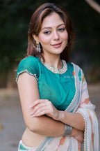 Cream chiffon paisley print saree (only saree)