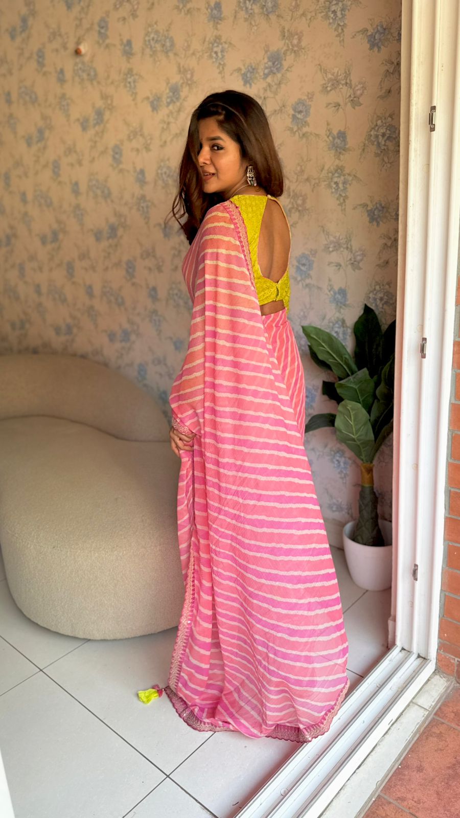 Pink lehariya saree with green hakoba embroidery blouse