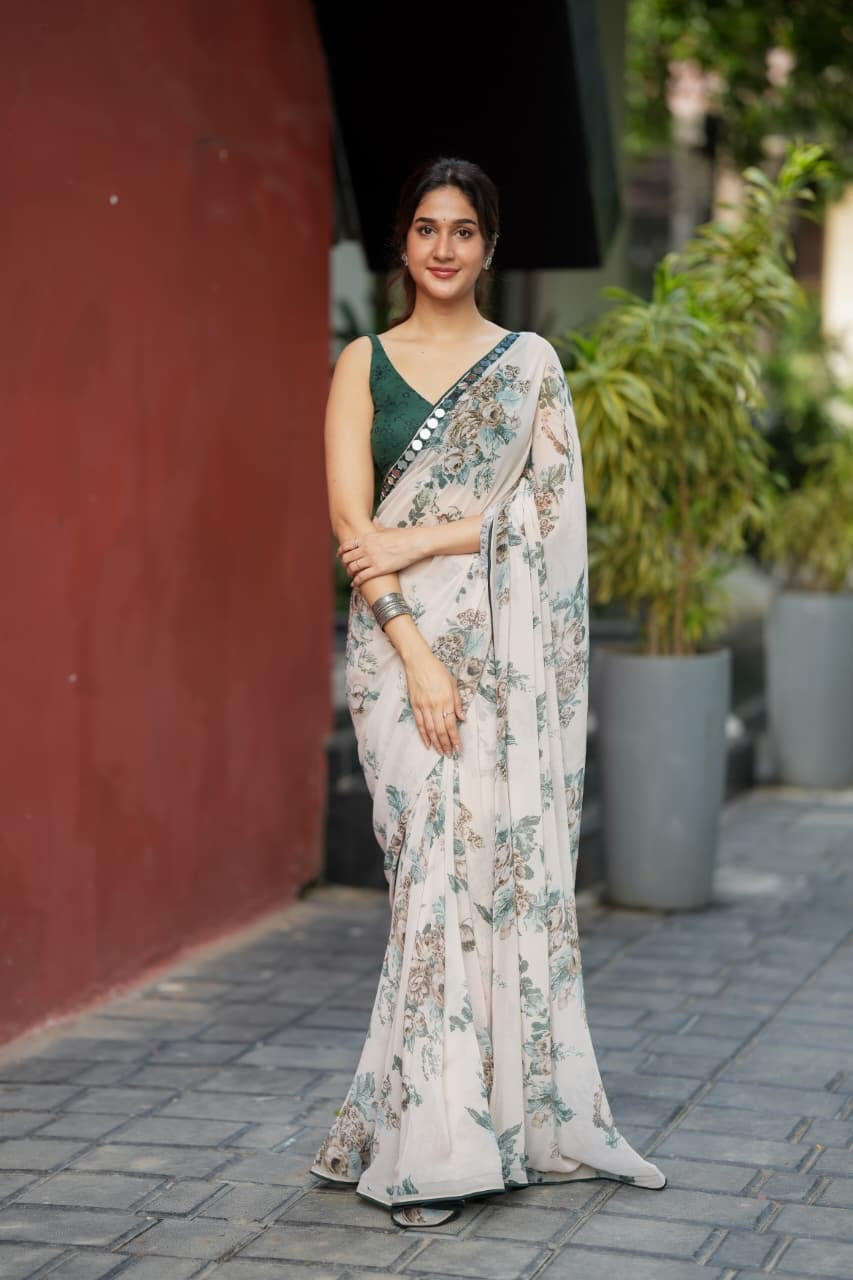 Half white chiffon floral saree with hand work blouse