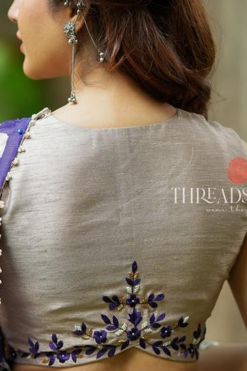 Purple chiffon floral saree with hand work blouse