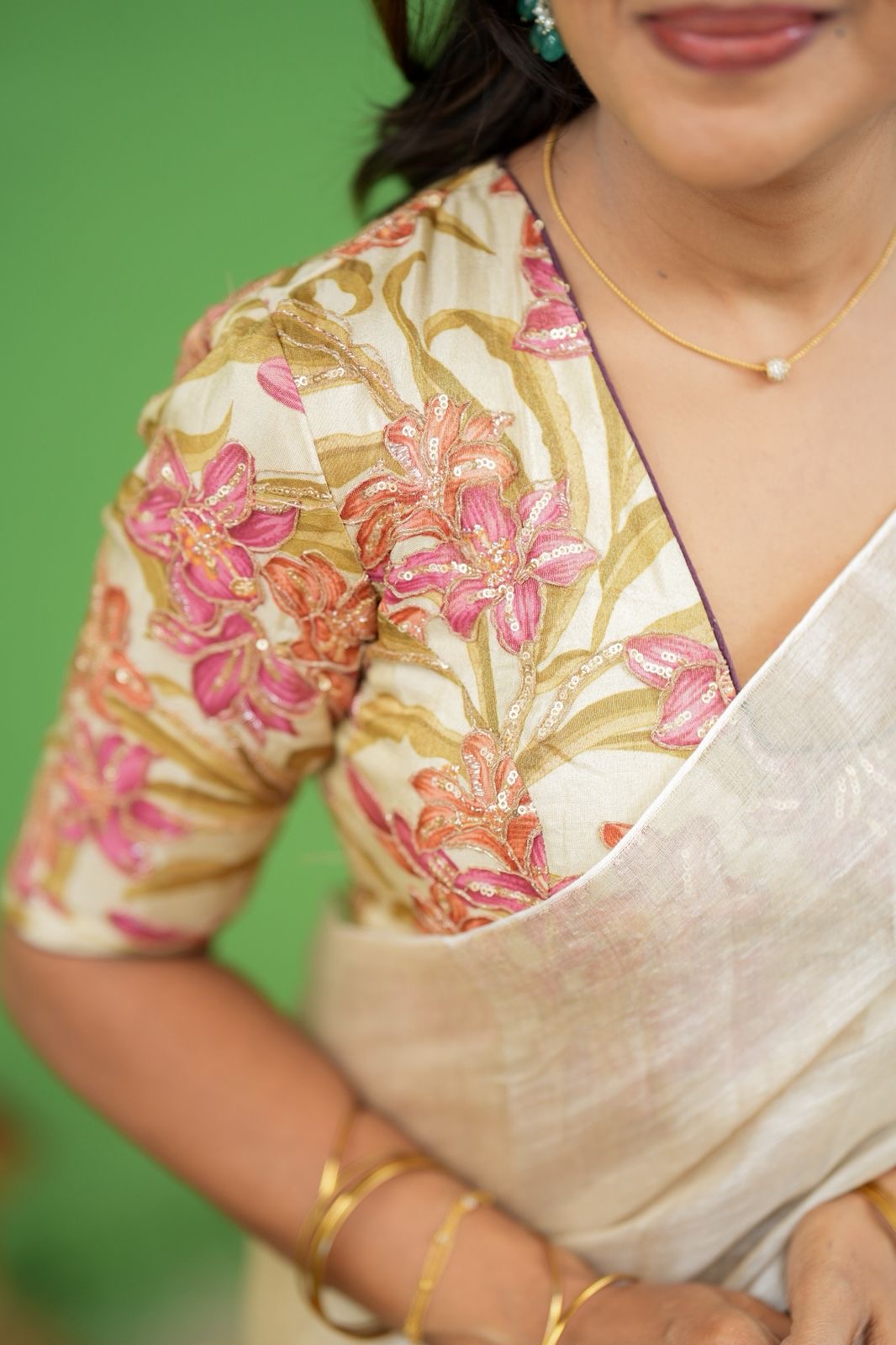 Cream soft tissue saree with embroidered blouse