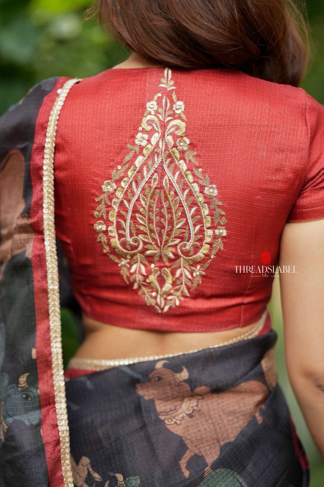 Black cow kota saree with paisley hand work blouse