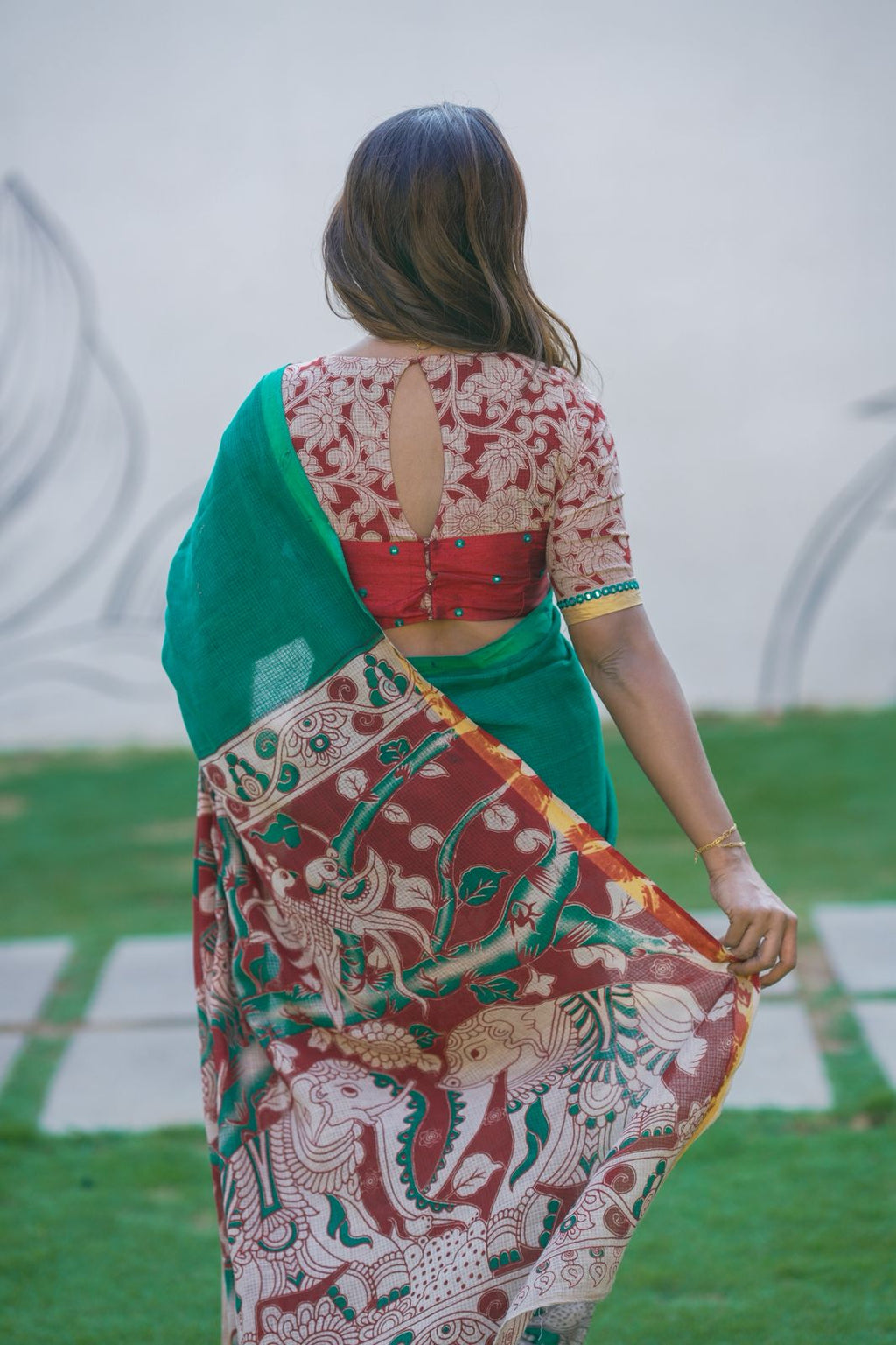 Green kota saree with kalamkari work blouse