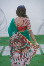 Green kota saree with kalamkari work blouse