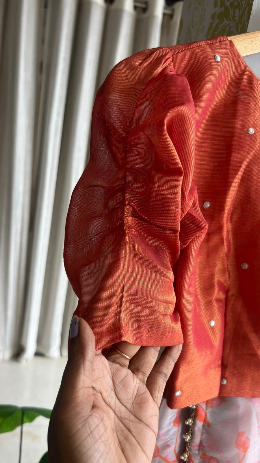 Reddish orange tissue floral hand work blouse(only blouse)