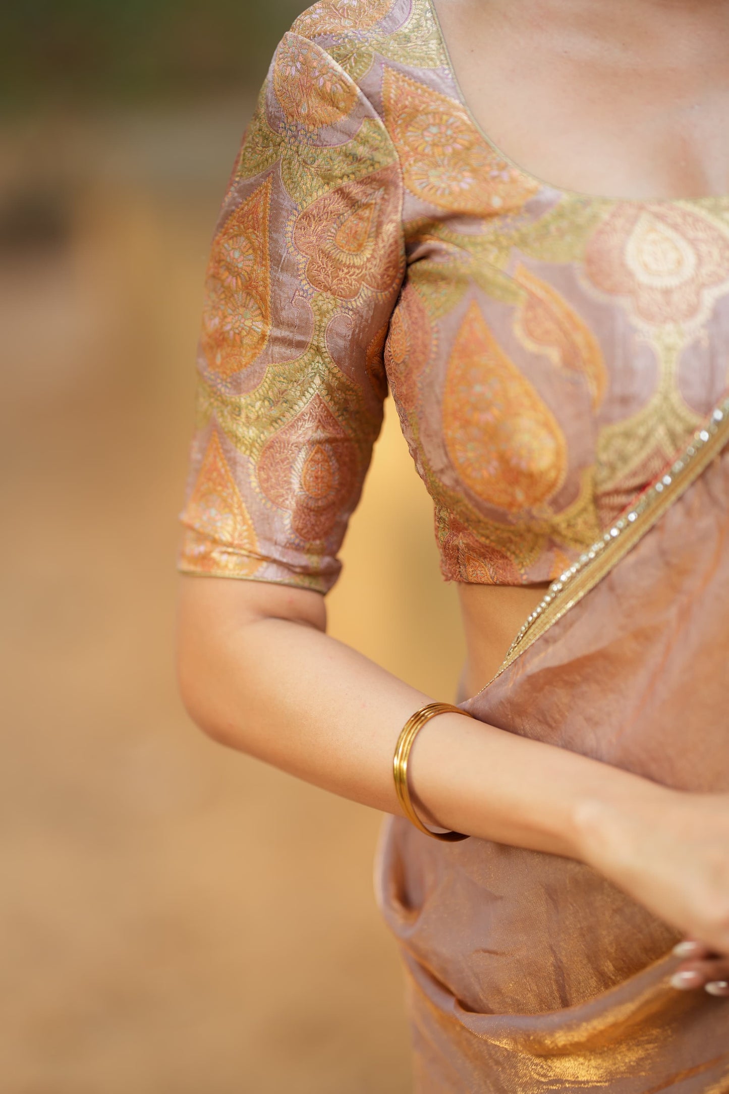 Golden peach glass tissue saree with banarasi blouse