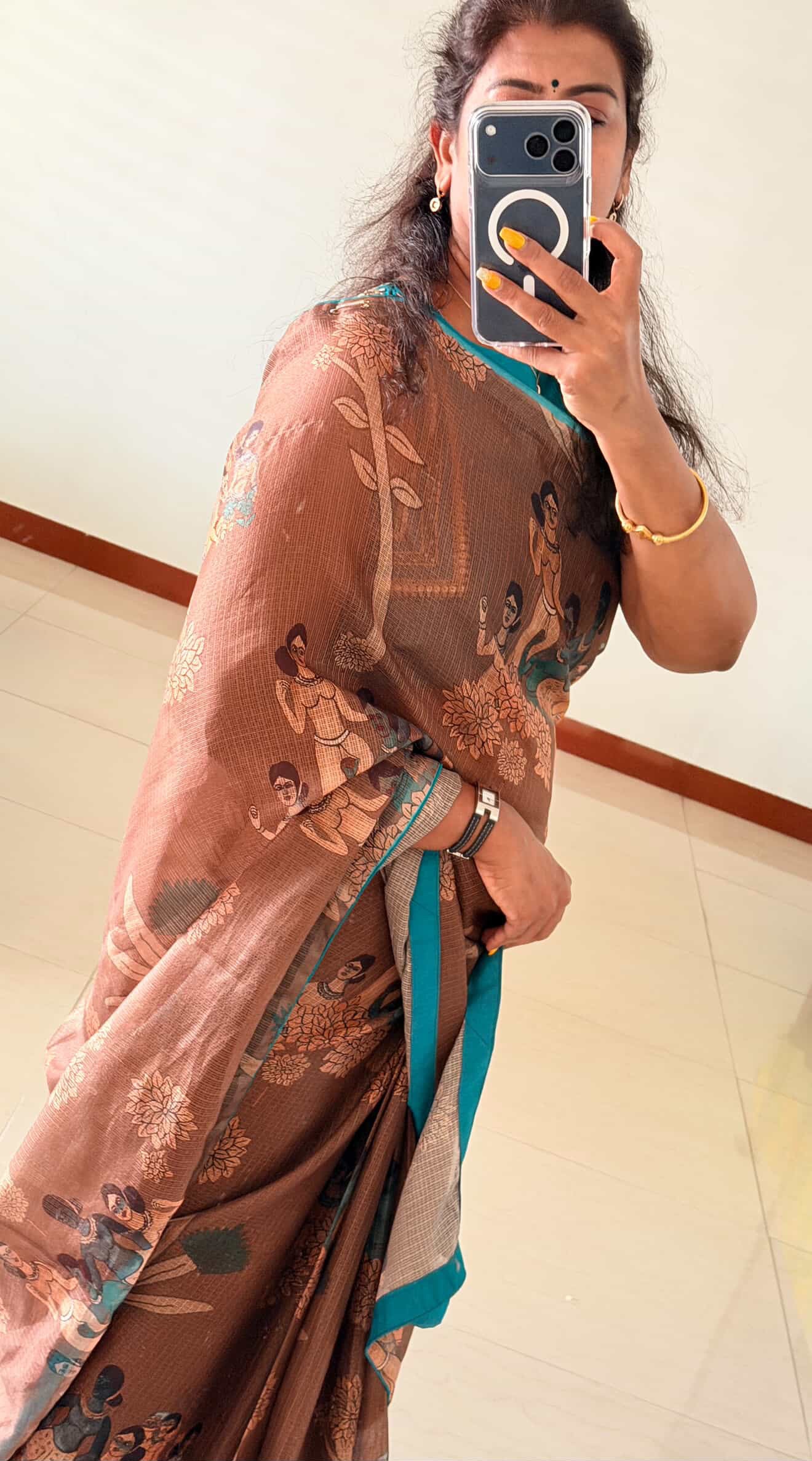 Brown kalamkari kota saree with blue hand work blouse