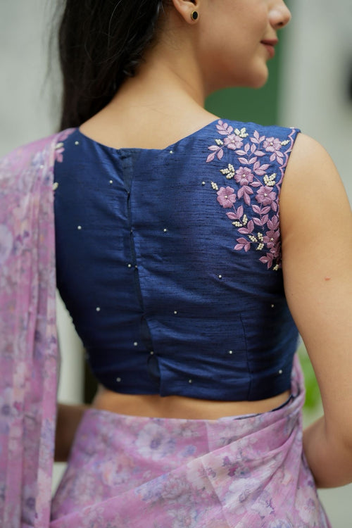 Lavender chiffon saree with blue hand work blouse