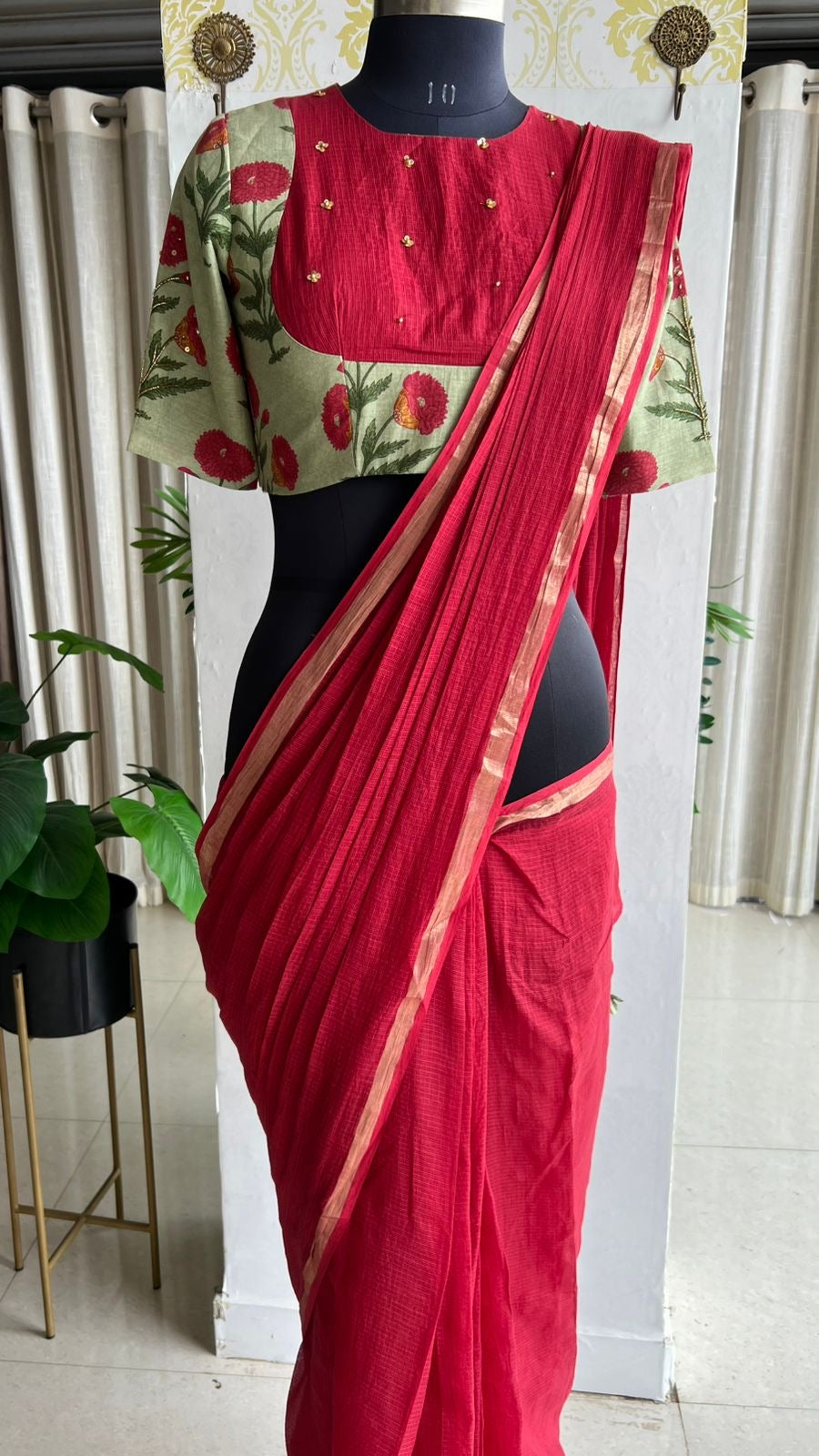Maroon pure kota saree with green hand work blouse