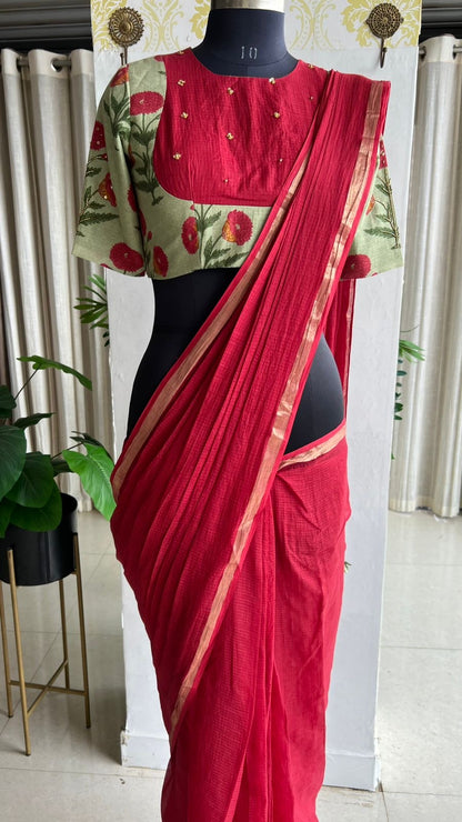 Maroon pure kota saree with green hand work blouse