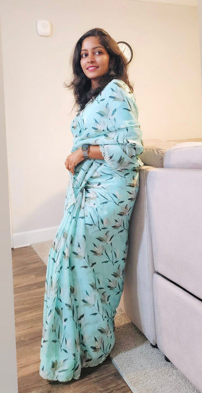 Cyan blue chiffon saree with hand worked blouse