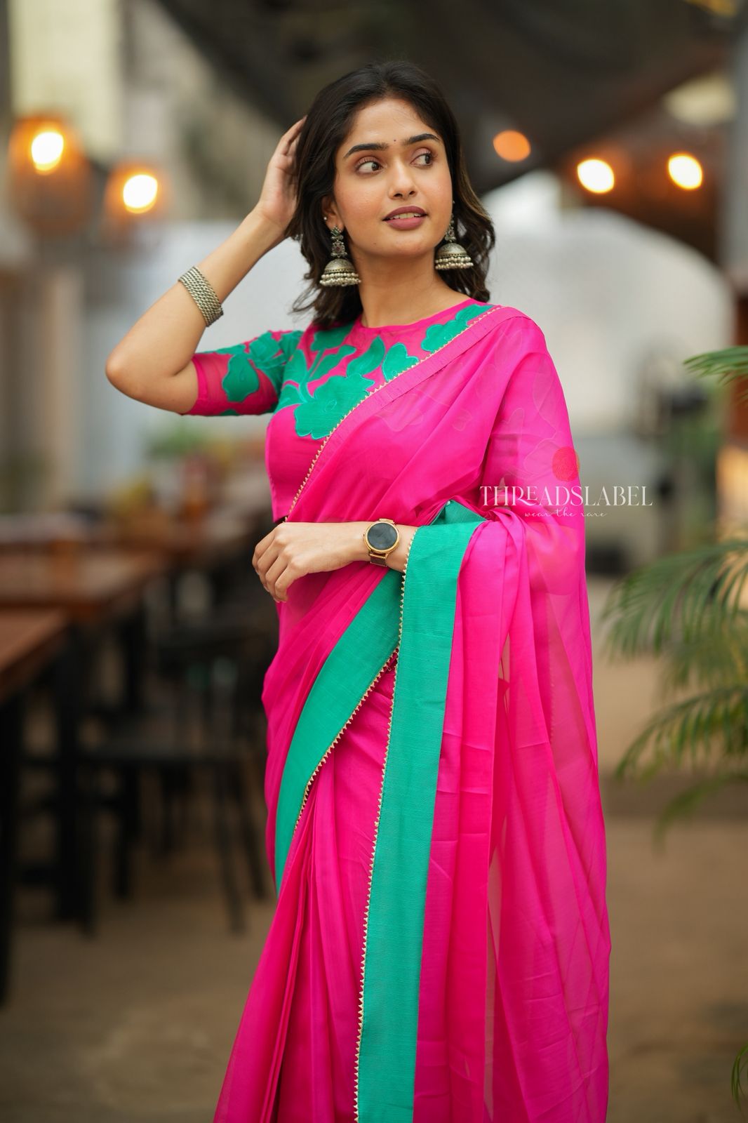 Pink organza saree with floral hand work blouse