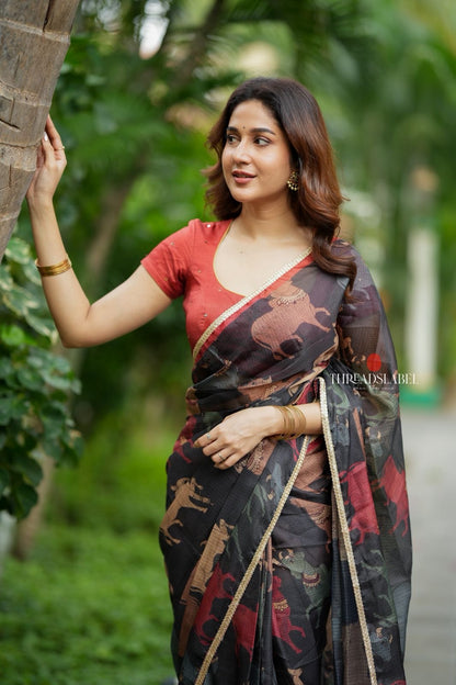 Black cow kota saree with paisley hand work blouse