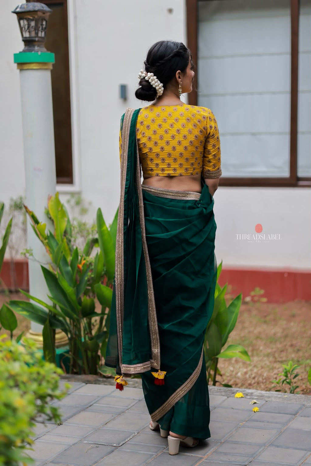 Green organza saree with yellow hand work blouse