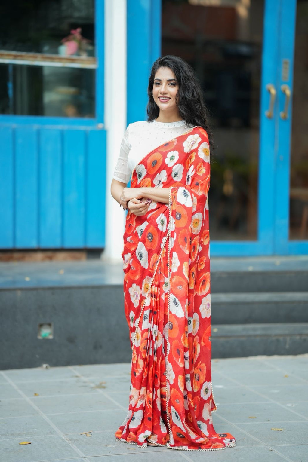 Orange red chinnon silk saree with white organza blouse