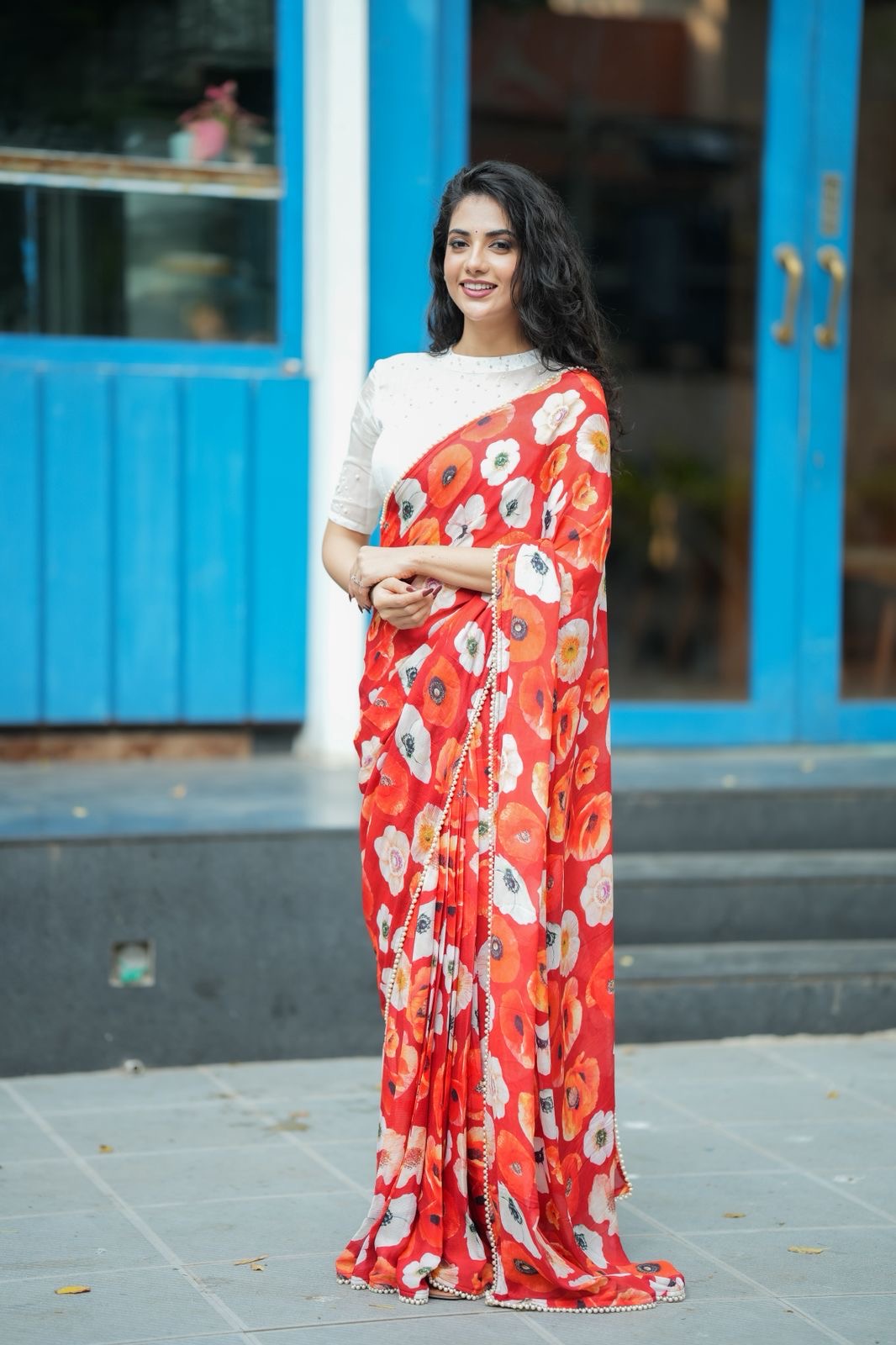 Orange red chinnon silk saree with white organza blouse