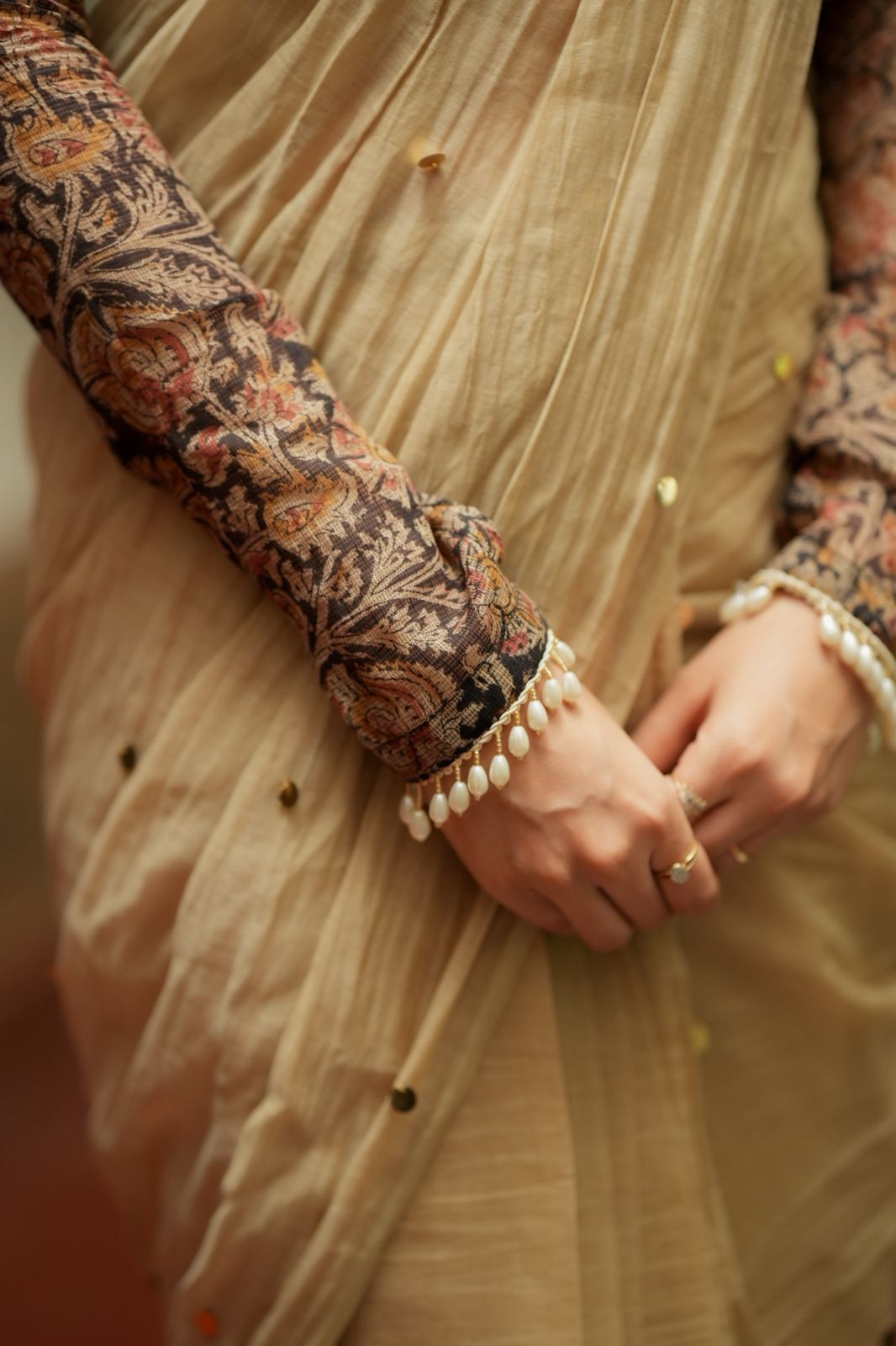 Cream malai chanderi saree with Ajrak print blouse