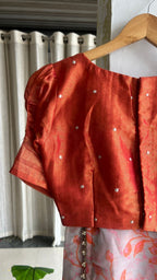 Reddish orange tissue floral hand work blouse(only blouse)