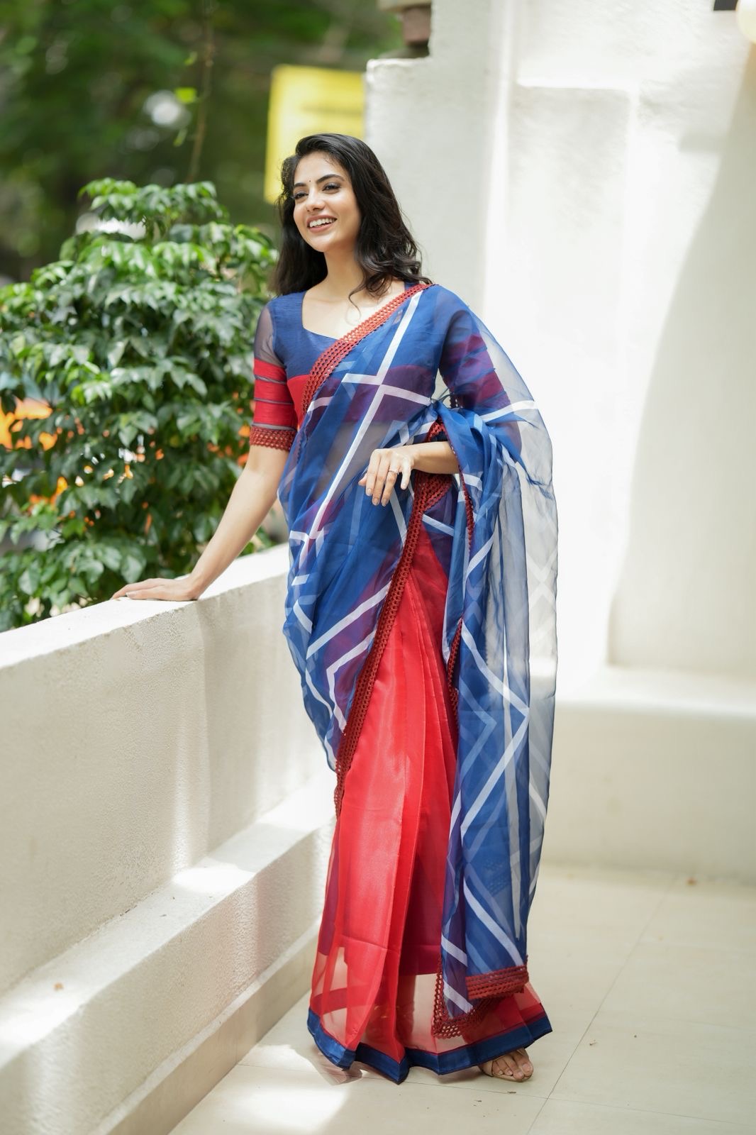 Blue maroon organza saree with patterned blouse