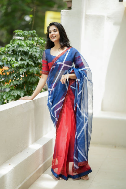Blue maroon organza saree with patterned blouse