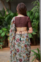 Sage green floral chiffon saree with hand work blouse