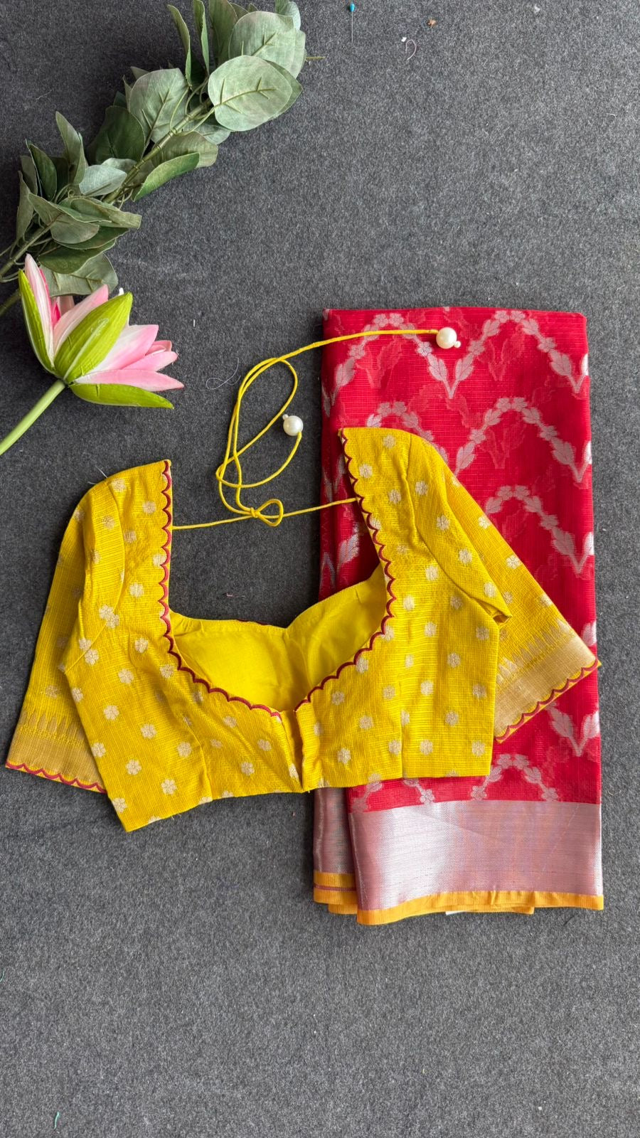 Red soft kota silk saree with yellow embroidered blouse