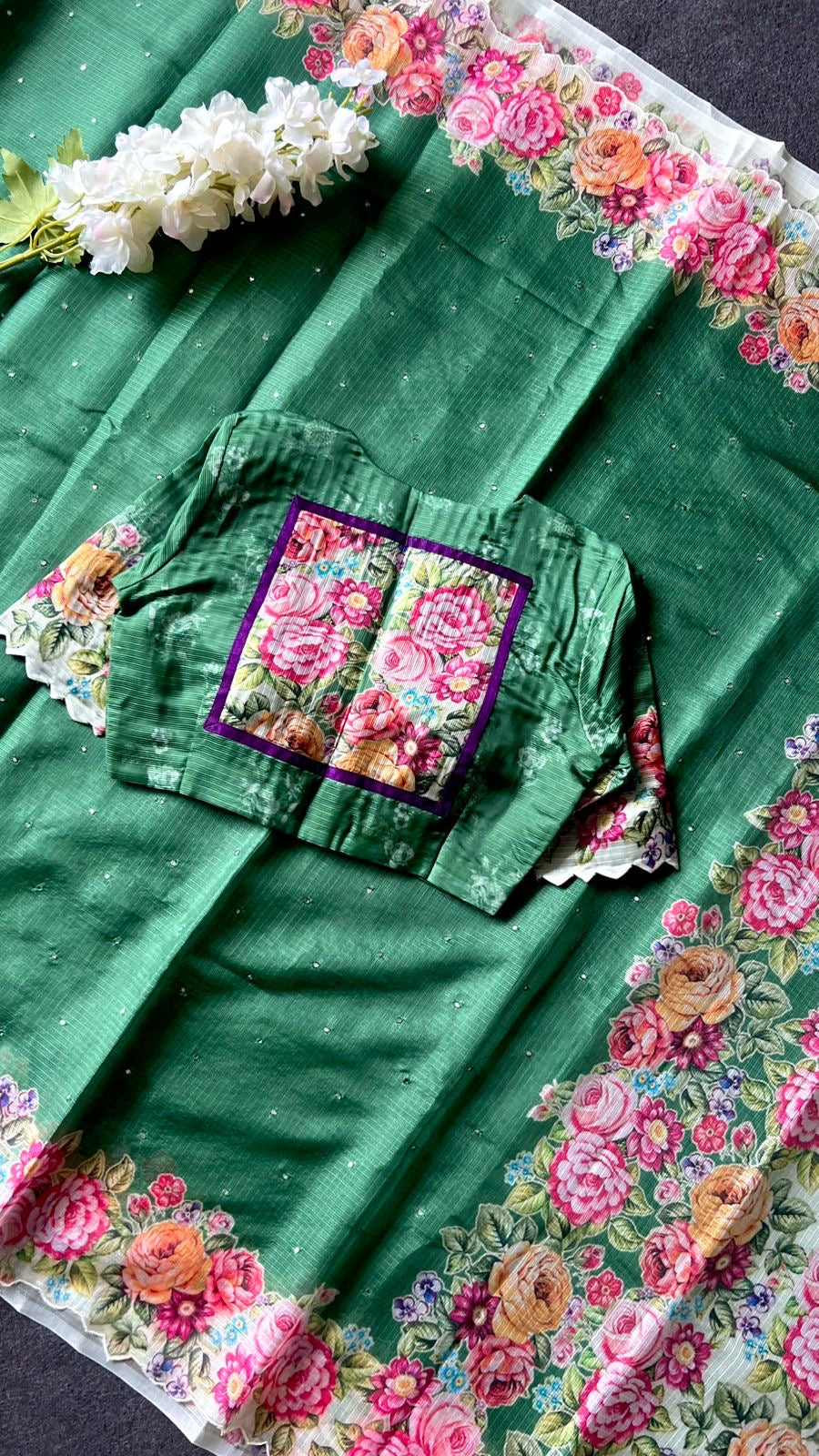 Green floral kota doria saree with patterned blouse