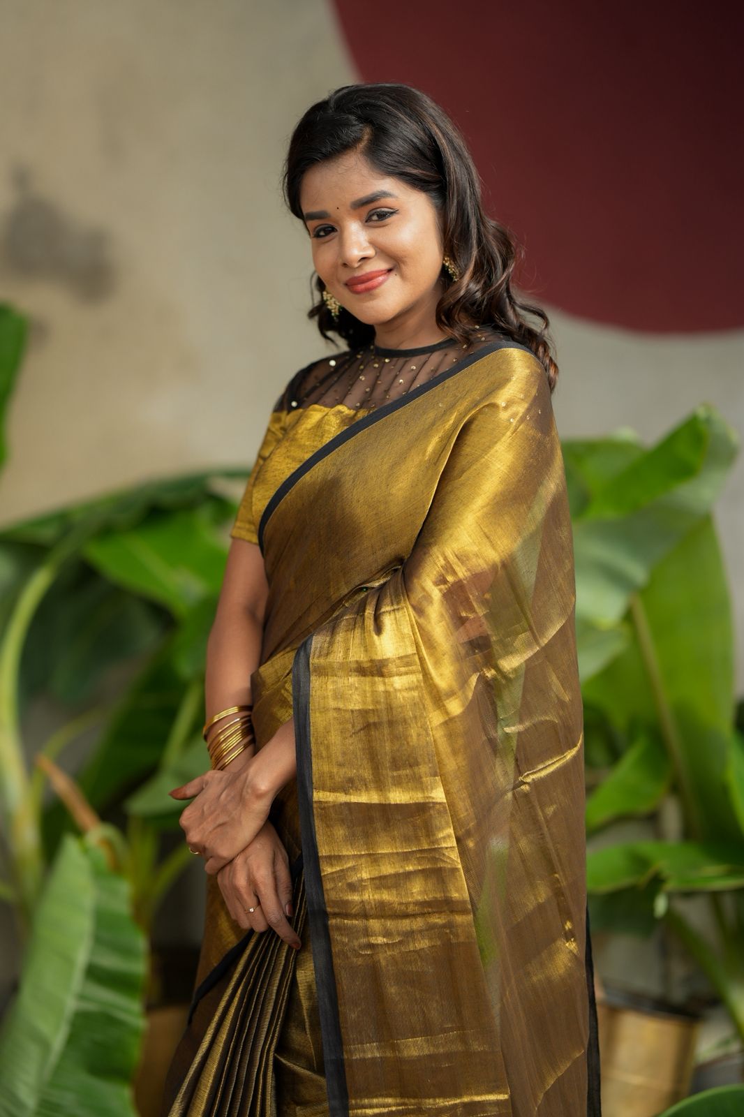 Golden soft tissue saree with hand work blouse