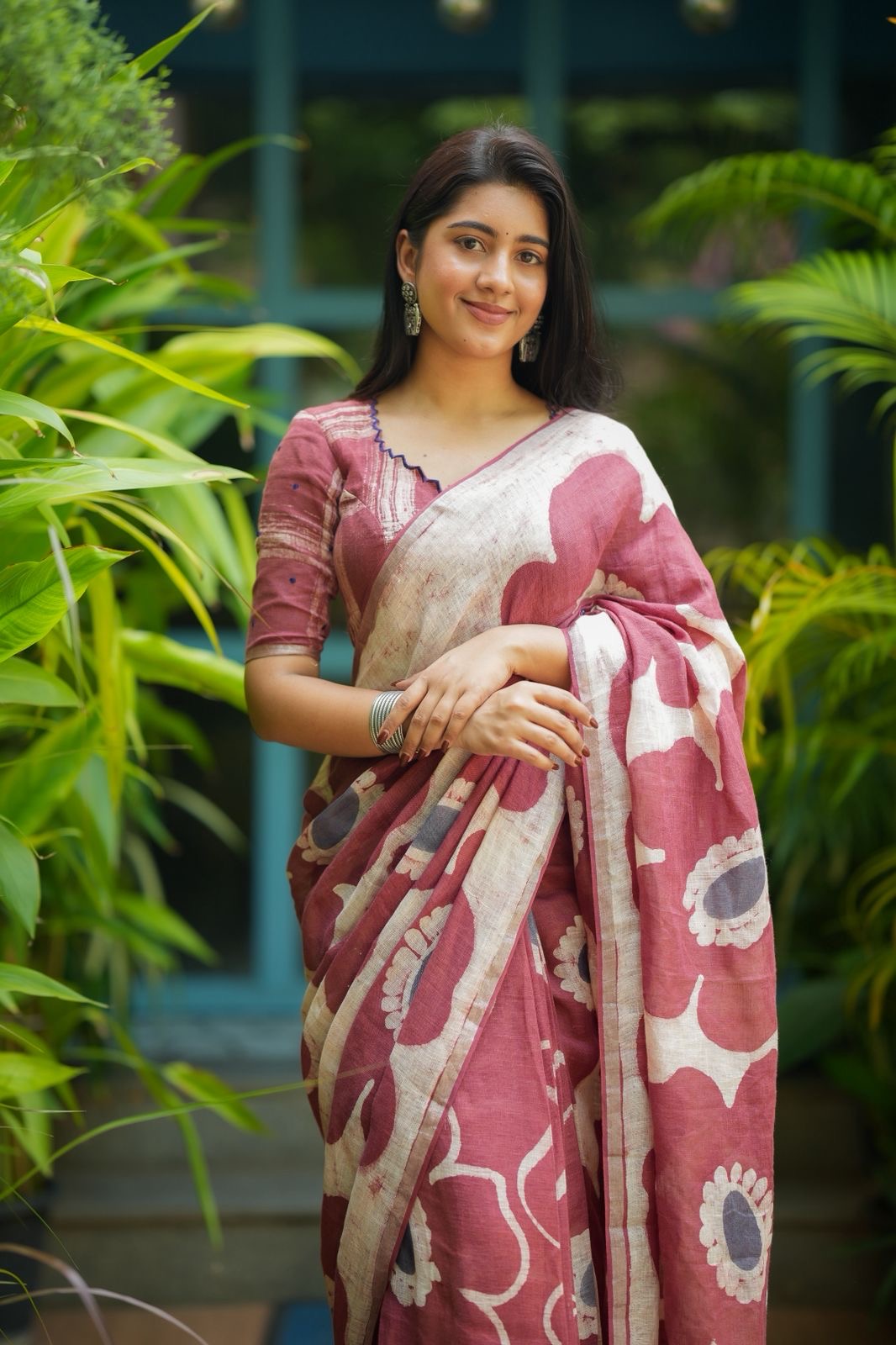 Brown linen floral saree with hand work blouse