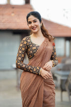 Brown malai chanderi saree with Ajrak print blouse