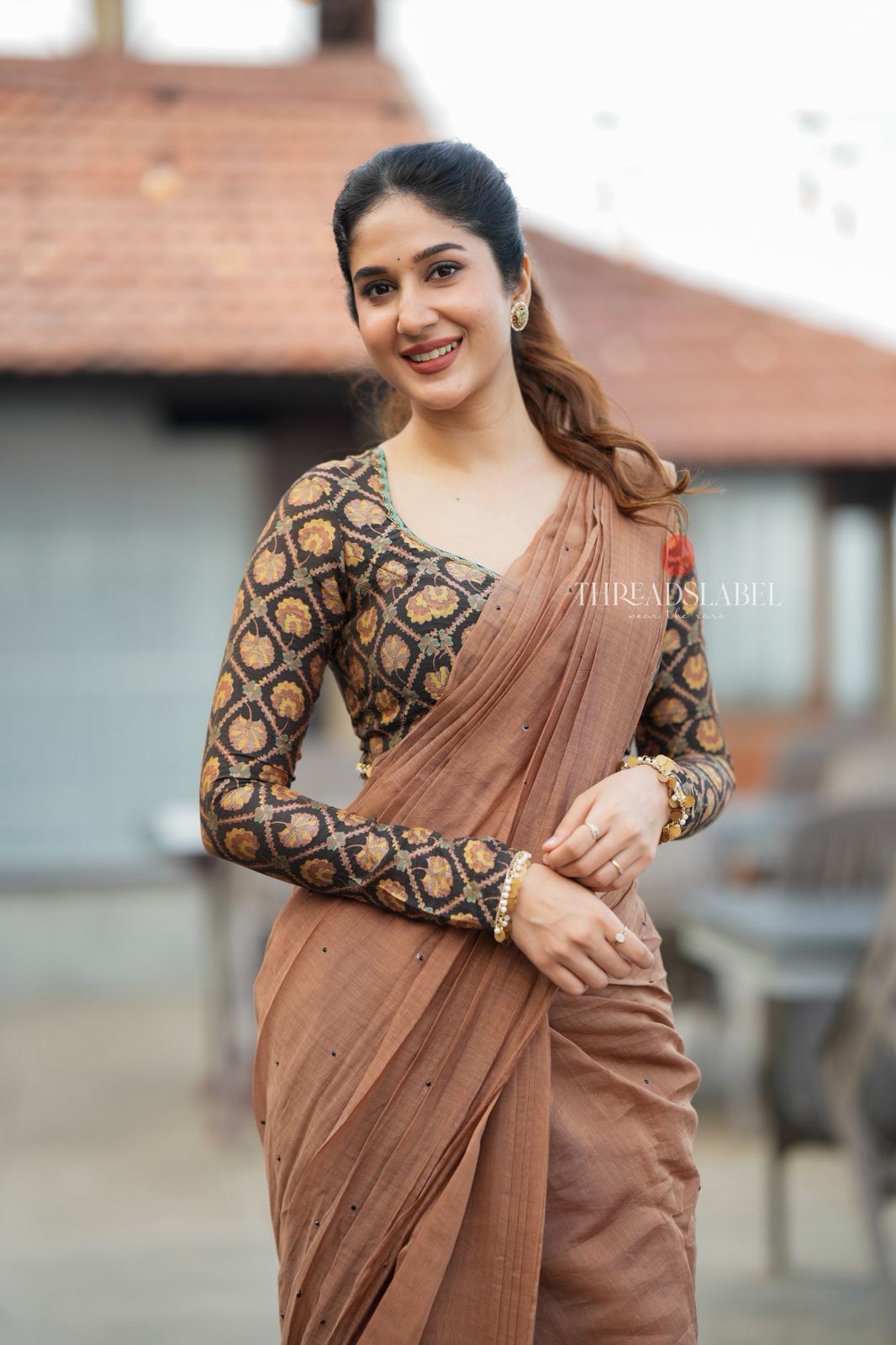 Brown malai chanderi saree with Ajrak print blouse
