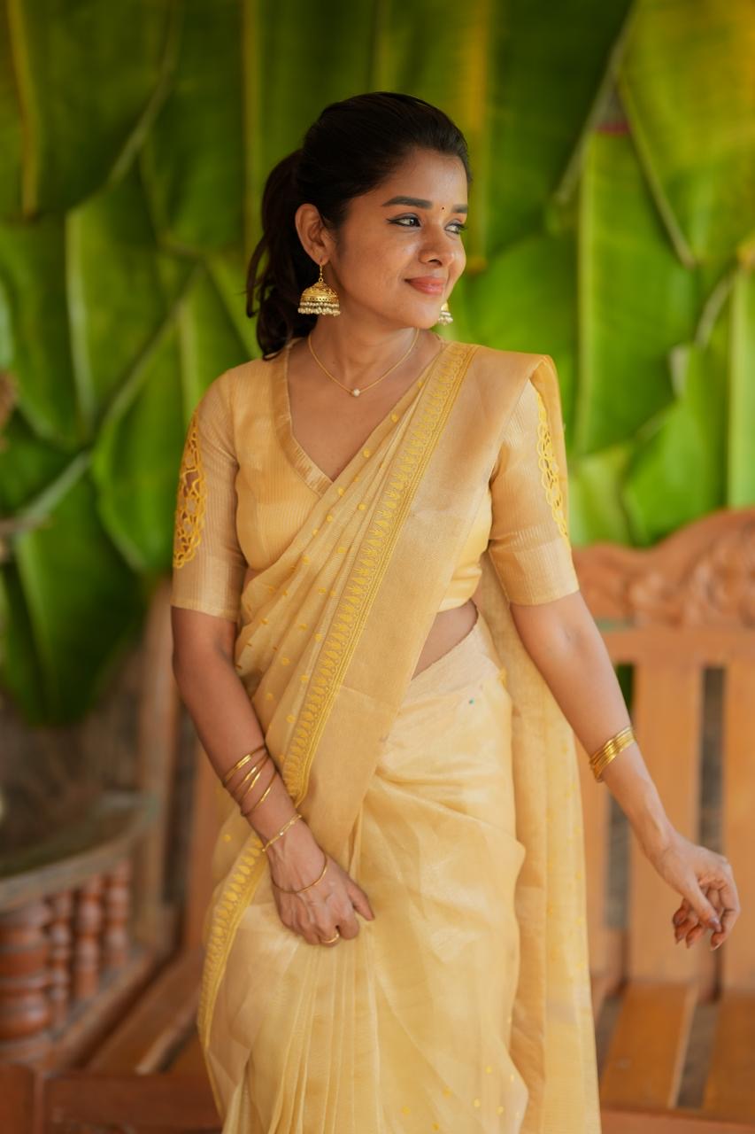 Gold kota doria saree with hand work blouse