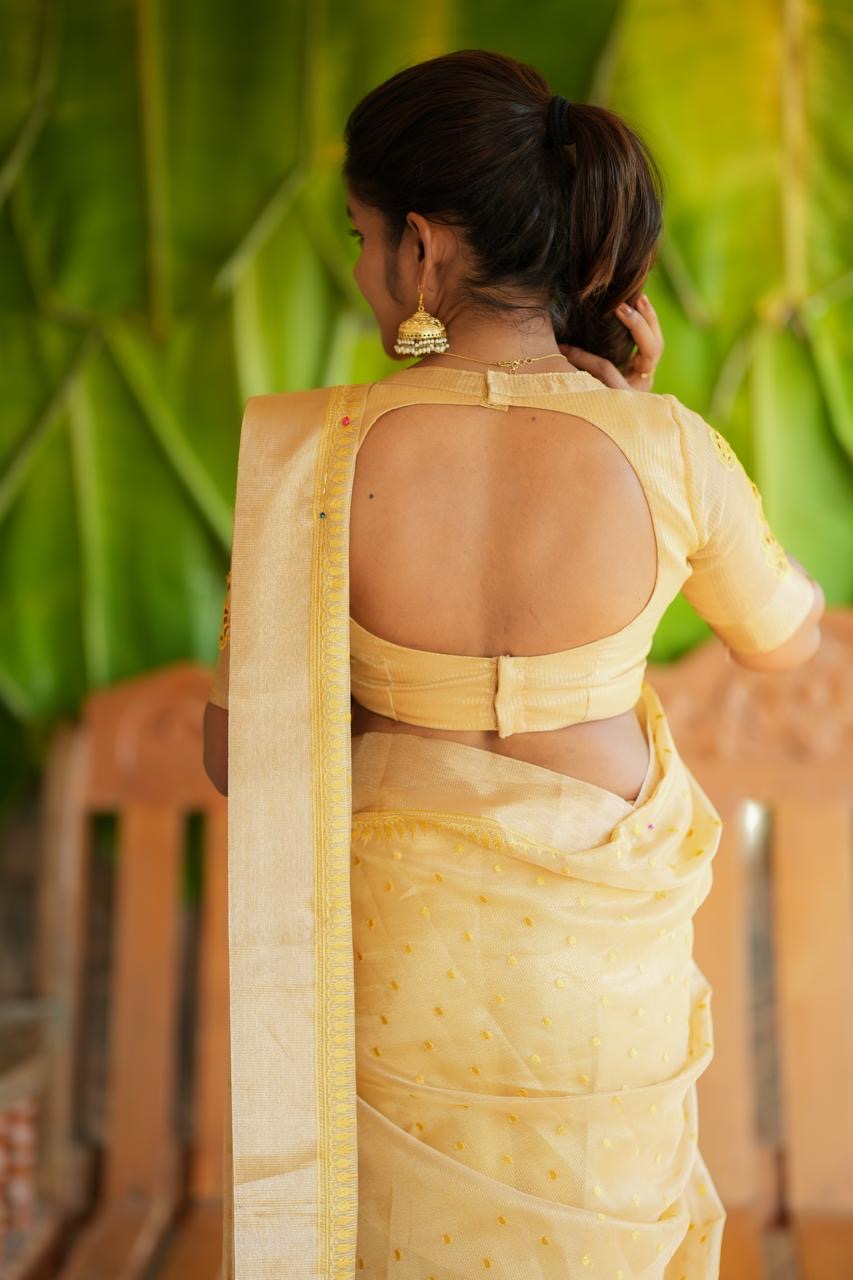 Gold kota doria saree with hand work blouse