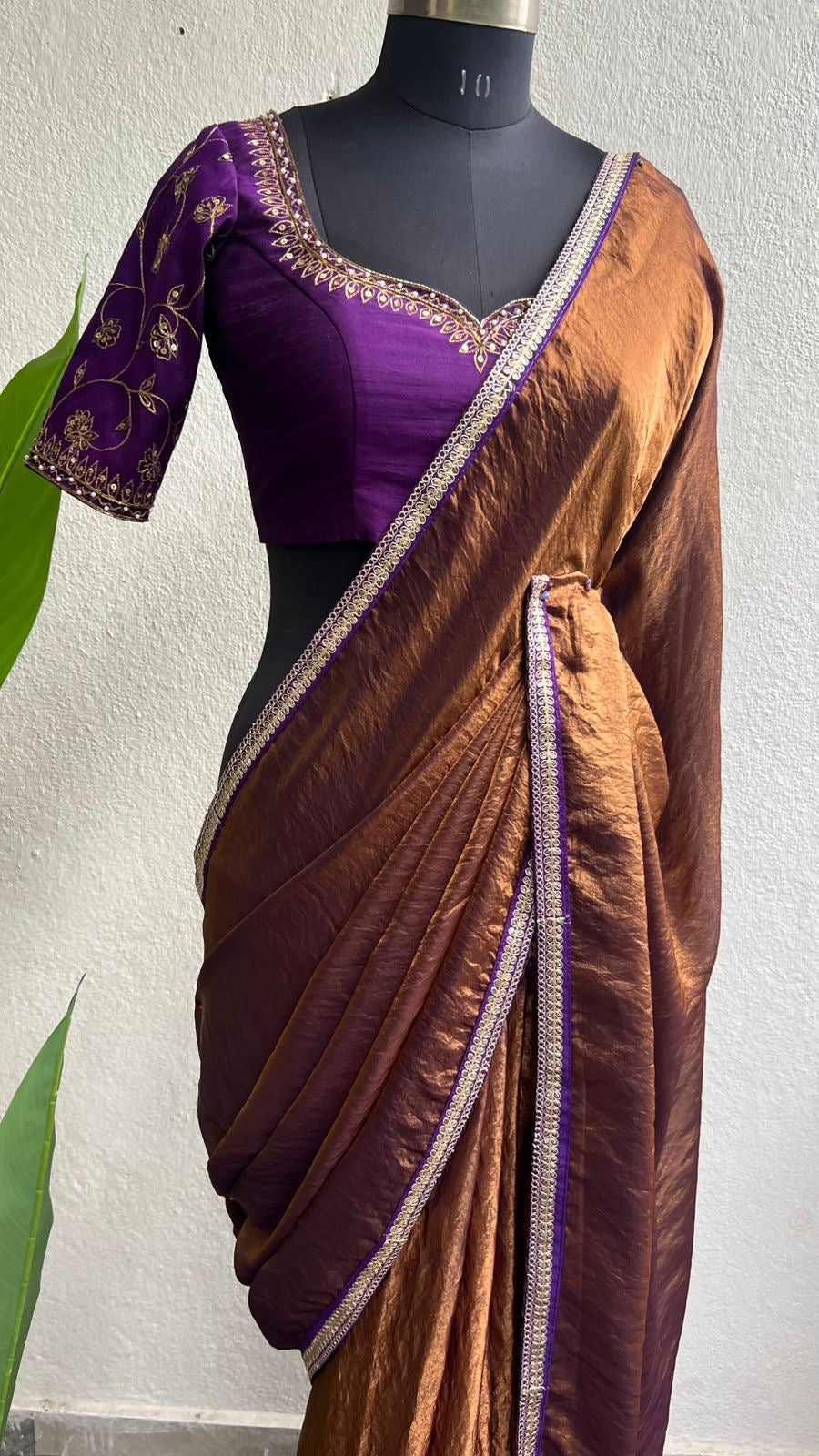 Coffee tissue saree with purple heavy hand work blouse