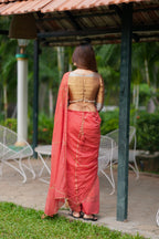 Orange rust saree with tissue handwork blouse