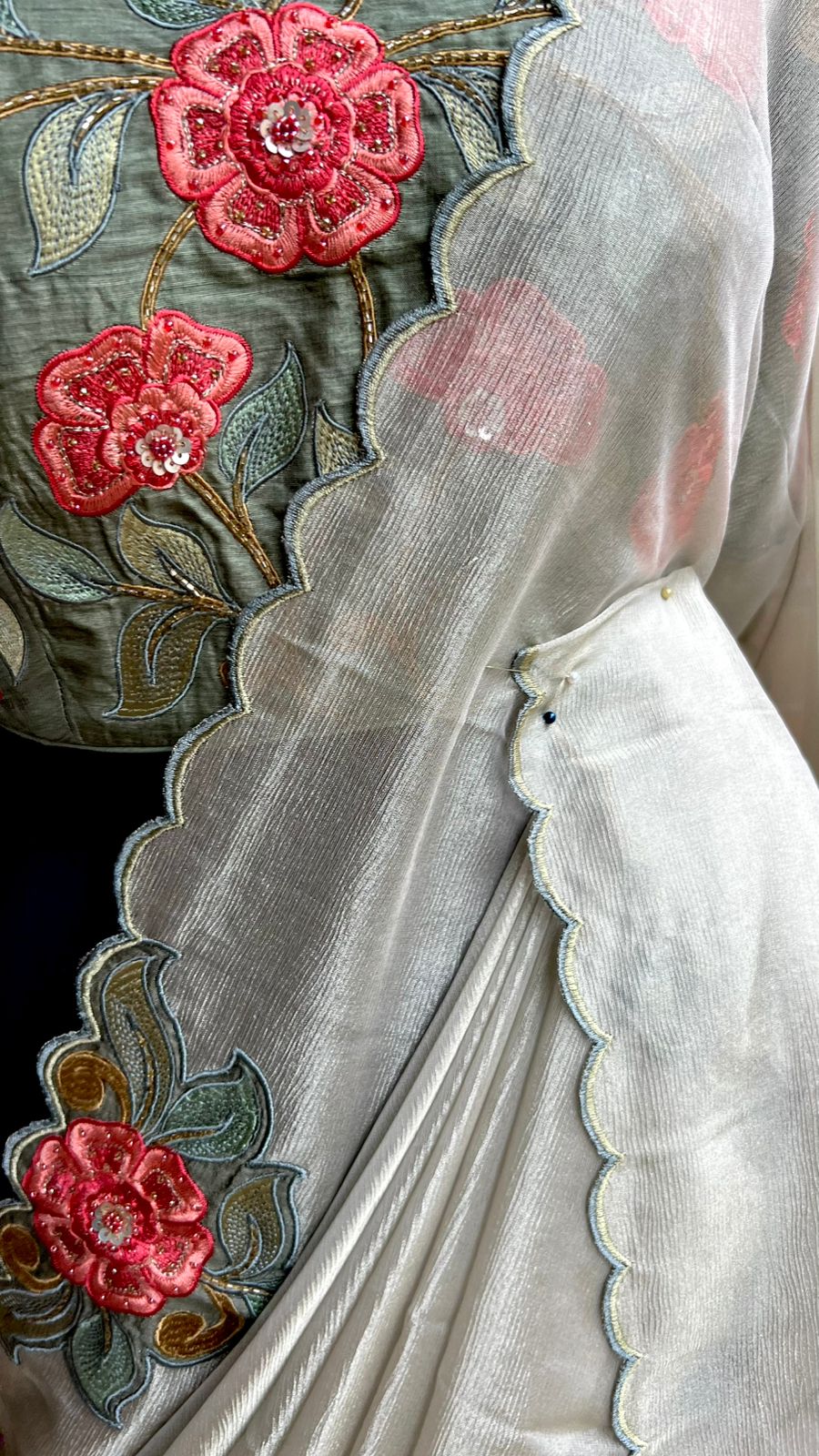 Half white textured organza saree with heavy handwork blouse