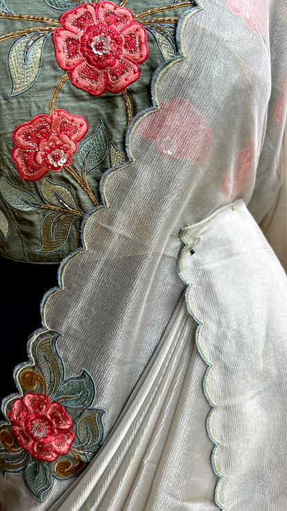 Half white textured organza saree with heavy handwork blouse