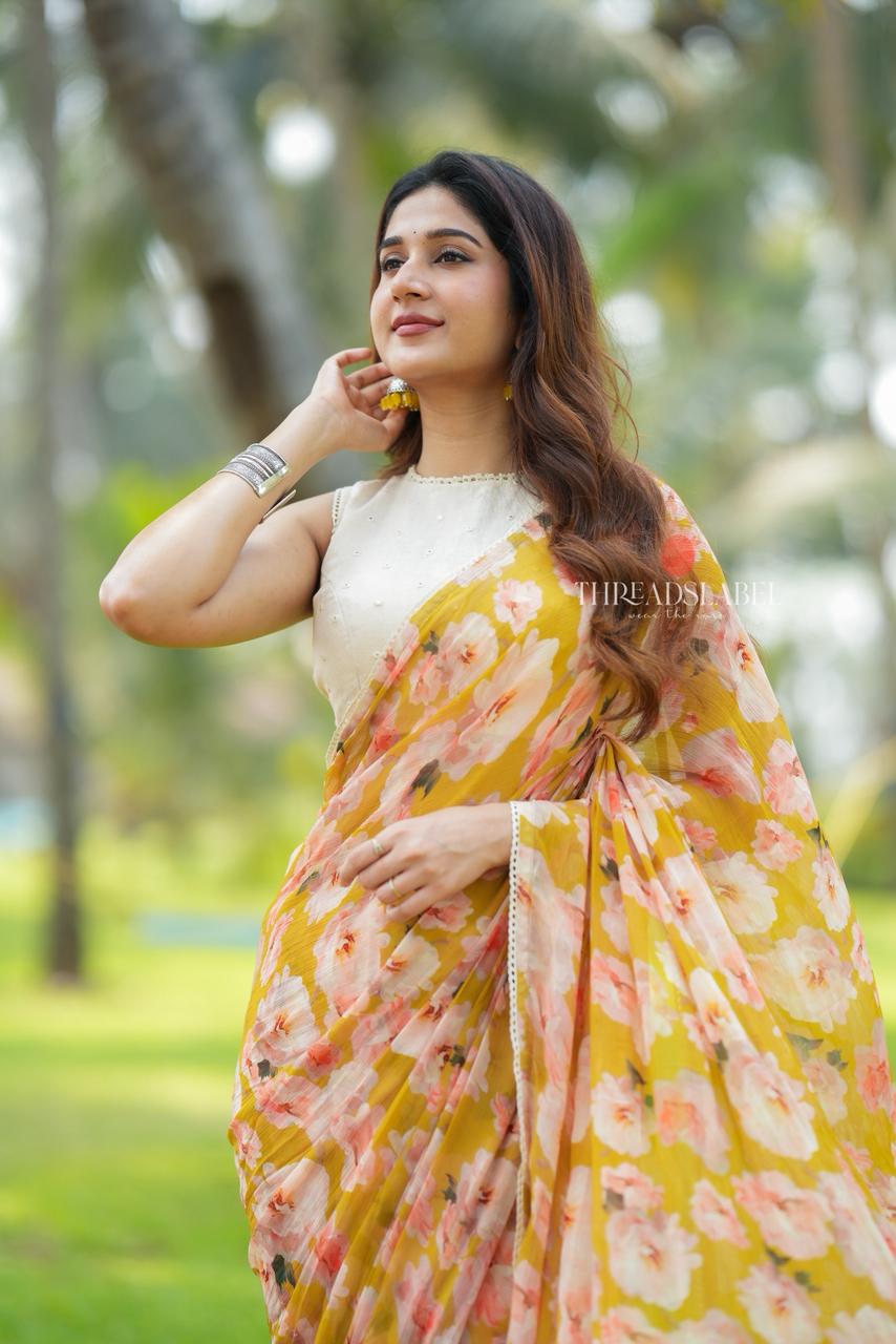 Fenugreek chiffon floral saree with linen mirror blouse