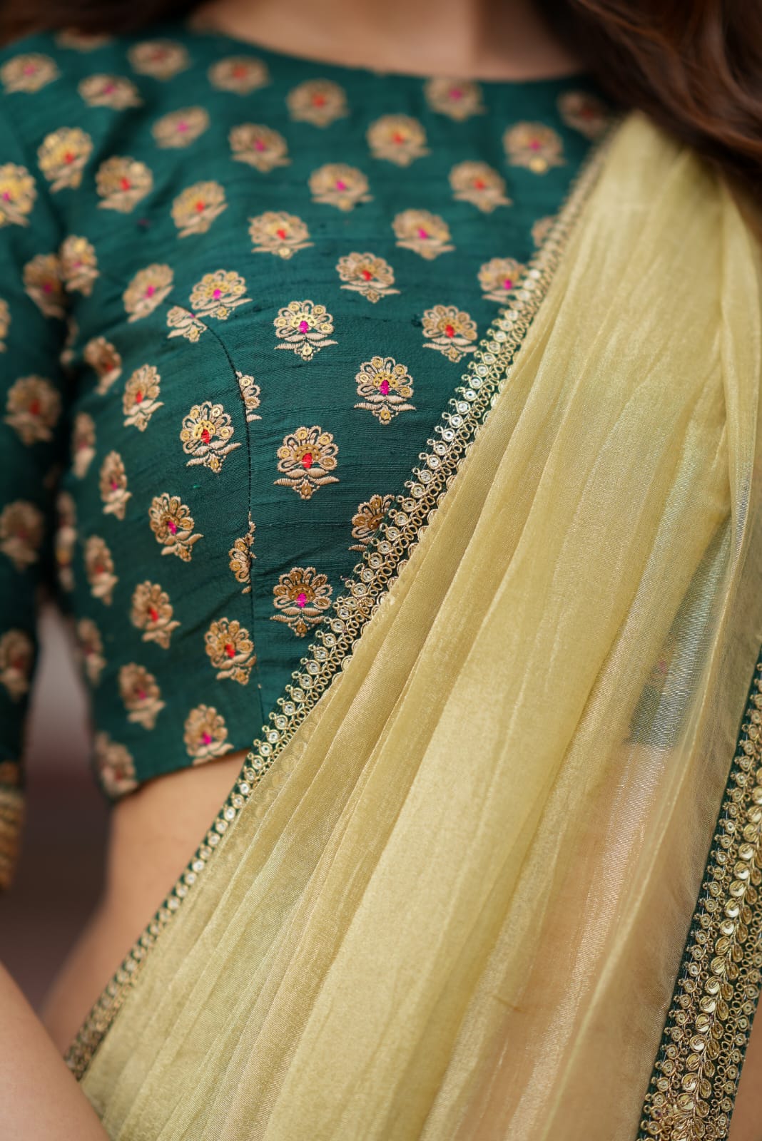 Gold tissue saree with green hand work blouse