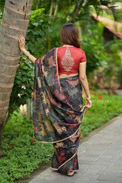 Black cow kota saree with paisley hand work blouse