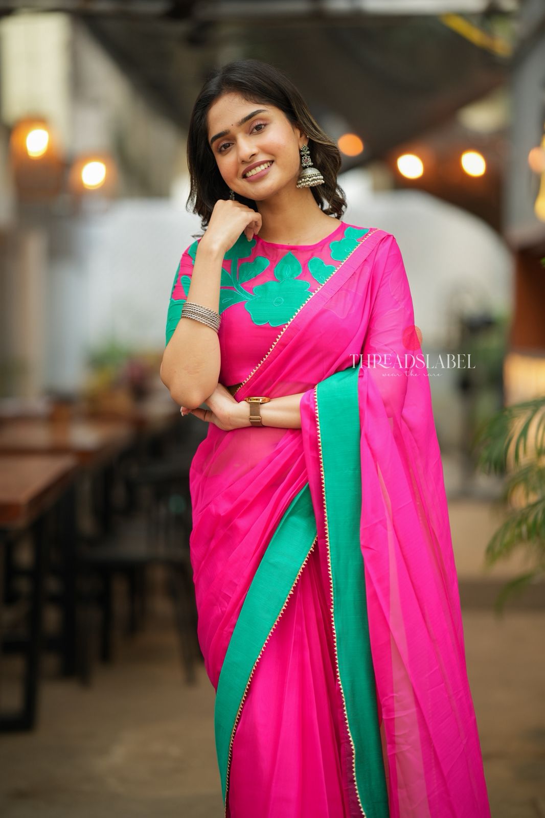 Pink organza saree with floral hand work blouse